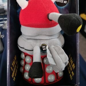 Red and Gray Talking Plush Toy